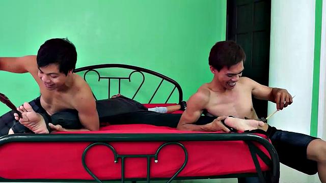 Cute tickle boy "T-Boy" gets his turn to be tied down and tickled senseless.