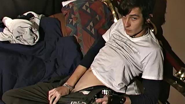 Skinny little 18 year old Clark Belmont is a sexy young guy, with that bad boy look. In the bedroom, he strips out of his baggy clothes and works up a boner.