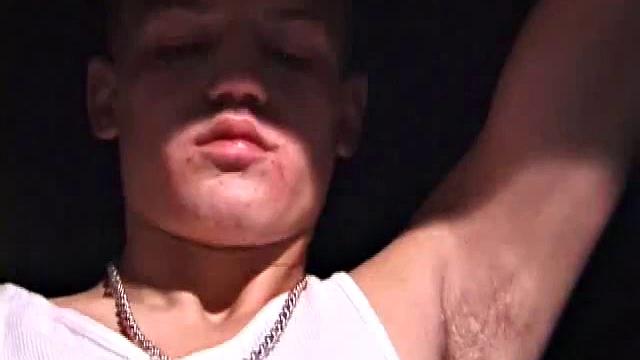 Not content with sitting while he jacks off, Lance teases the neighbors by standing on the roof outside his bedroom window to give everyone a show. Then he finishes by blowing his cum load onto the floor of his bedroom.