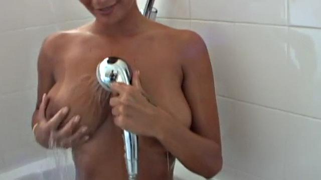 Blonde beach babe in high heels gets wet and wild with outdoor pussy play