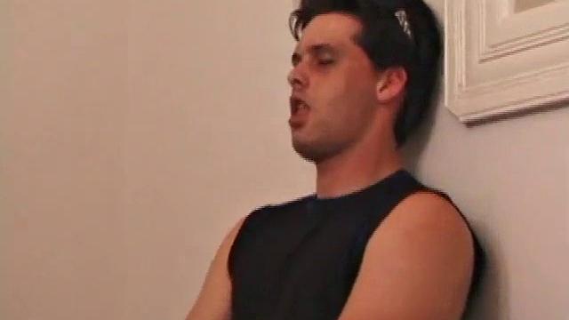 Kalvin is up and ready to go in his sleeveless muscle shirt. He works his cock on the bed and against the wall. This young man manipulates his meat, cupping and tugging on his nut sack as he strokes.