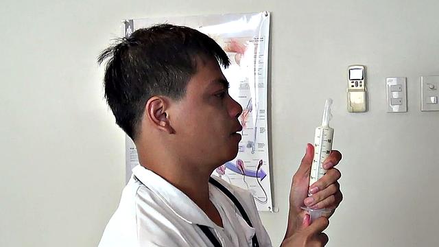 Orient doctor gapes twink's enema in infirmary