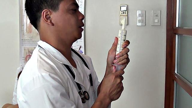 Orient doctor gapes twink's enema in infirmary