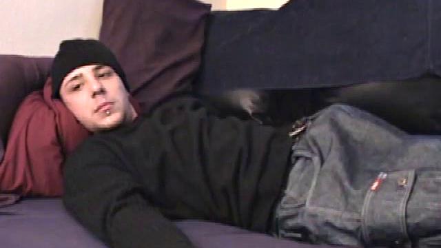 The always horny Bradley Shaw is kicked back on the couch in baggy jeans, dark sweater, and knit cap. When he pulls off the sweater and pants, out comes his cock.