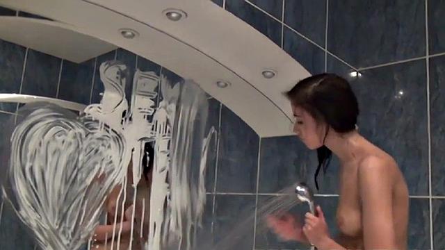 Petite teen masturbates using wine glass