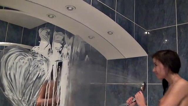 Petite teen masturbates using wine glass