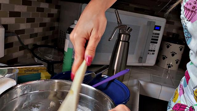 Cherie's bald pussy gets a taste of some kitchen fun