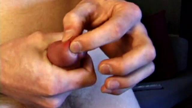 Shane pops in a new x-rated porn video and gets ready for a hot jack off session. He works his stiff dick with both hands, edging himself to a big finish. In the end Shane sends a warm cum load flying over his shoulder.